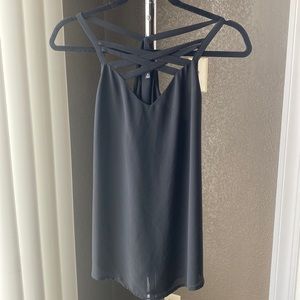 Angl women’s black tank-top in size small.